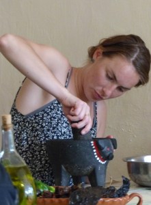 Prepping salsa in the molcajete